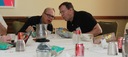 Jim Elliot (MIT) and Dick French (Wellesley) confer over a debris field of
lunch products.
